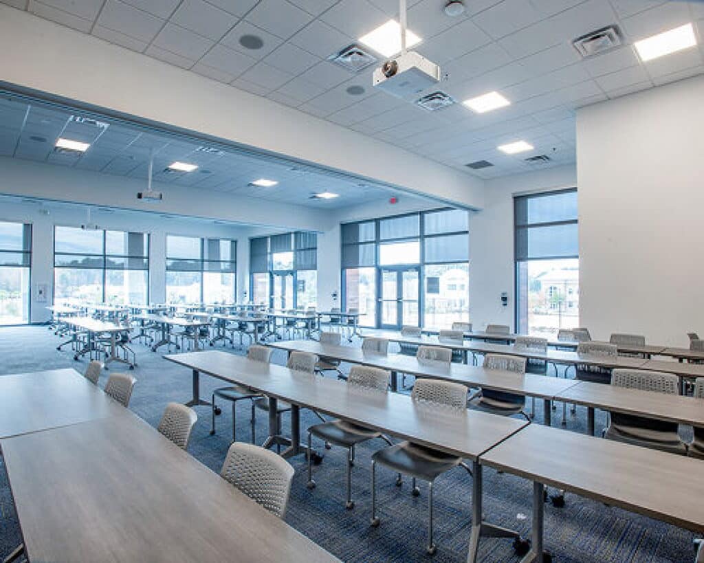 classroom full of chairs and tables at the culinary institute of the south after lightgauge co renovation and construction finished